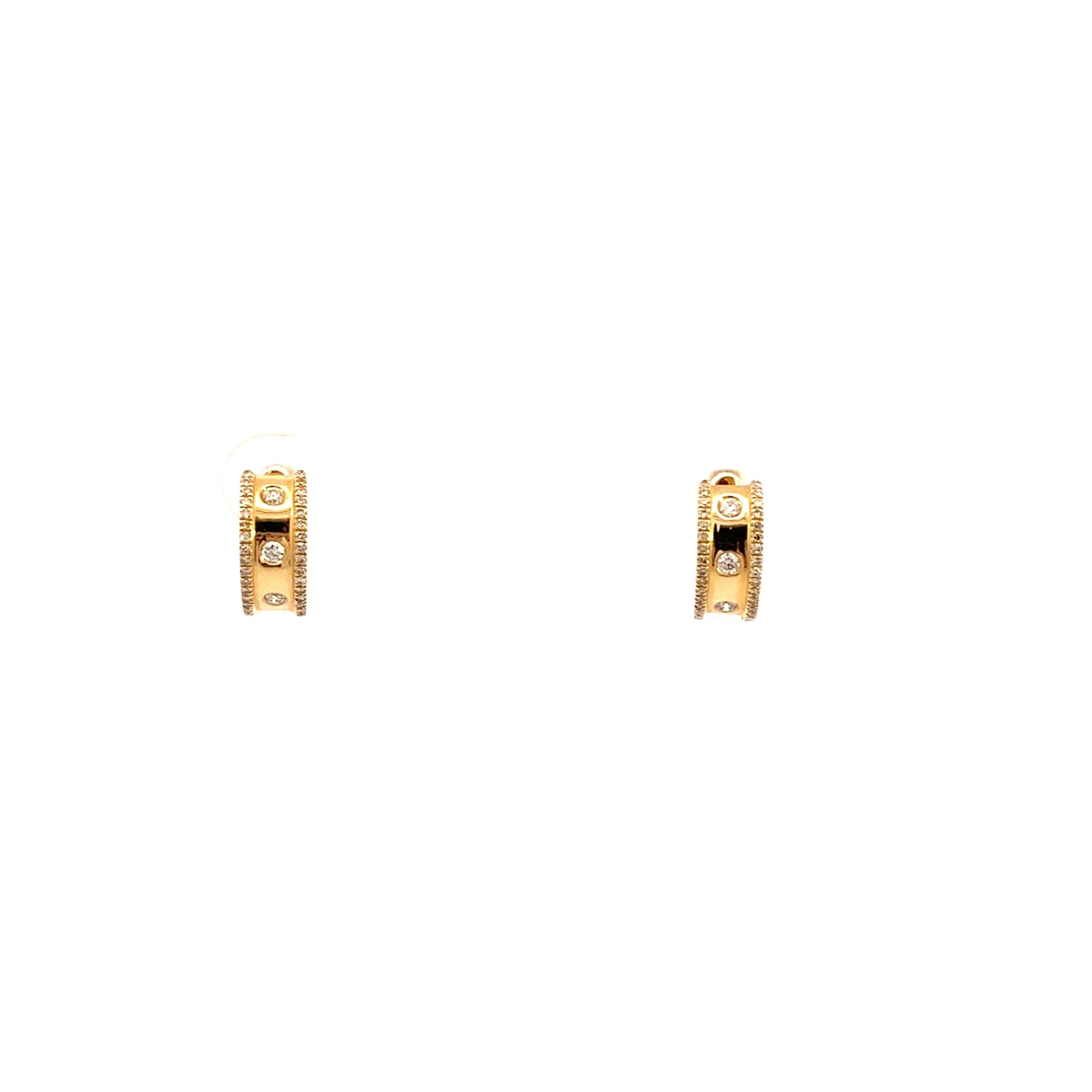 Hoop earrings with diamond string edges and larger centers in 14kt yellow gold by Bassali - Gaines Jewelers