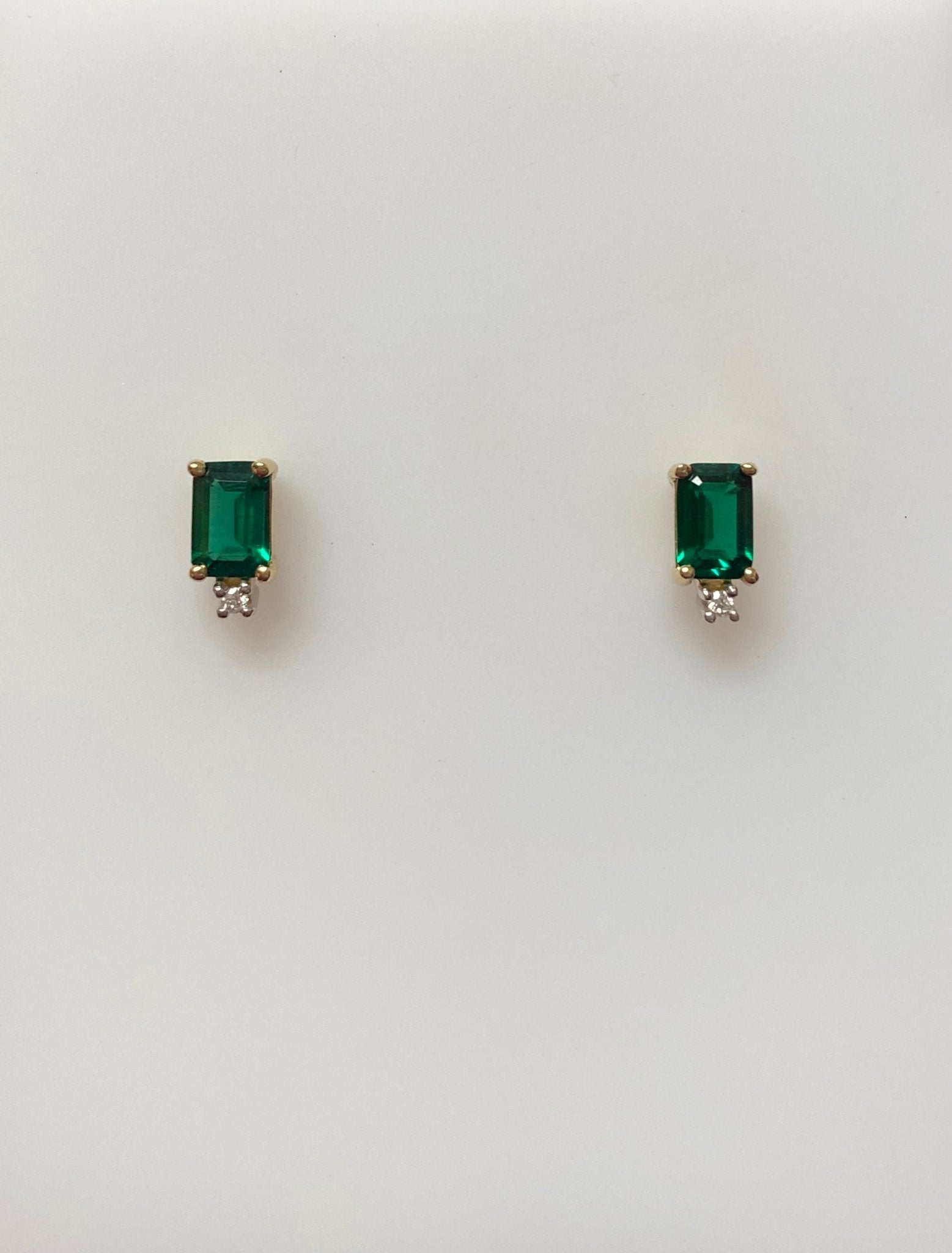 Lab Emeralds, Emerald Cut with Tiny Diamond at Bottom 14kt Yellow Gold Stud Earring - Rego - Gaines Jewelers