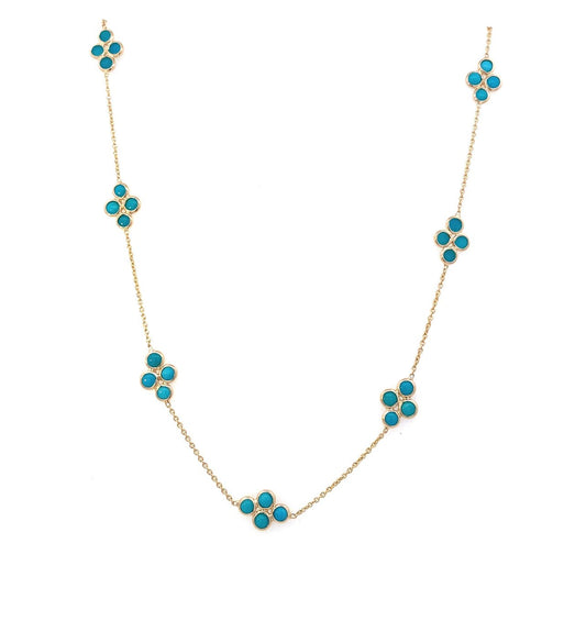 Necklace designed with stations of turquoise clusters in 14kt yellow gold - Gaines Jewelers