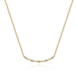 Necklace in a trapeze style set with diamond stations 14kt yellow gold - Gaines Jewelers