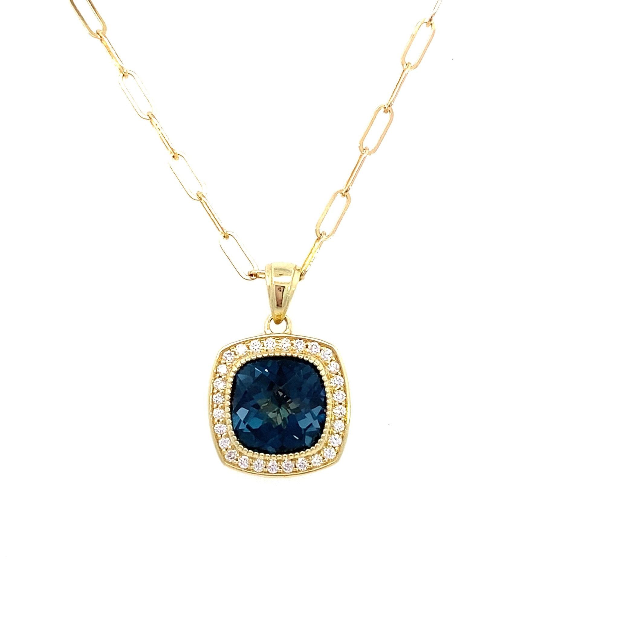 Necklace set with a London blue topaz & diamond halo on paperclip chain 14kt yellow gold - Gaines Jewelers