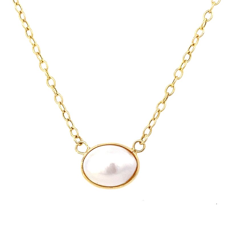 Necklace set with a mabe pearl in a bezel 14kt green gold - Gaines Jewelers