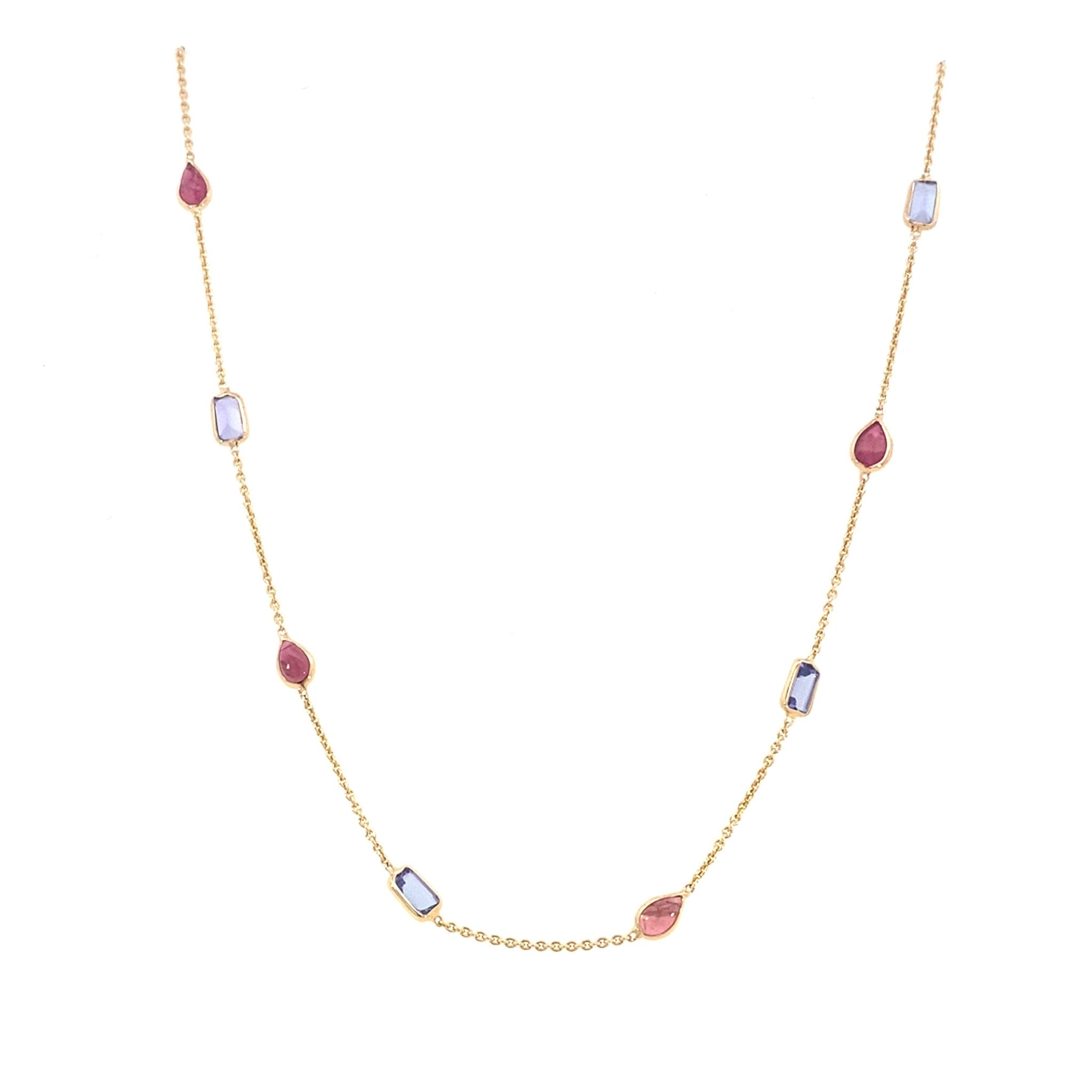 Necklace station style with pink tourmaline & tanzanite in 14kt yellow gold by Raymond Mazza - Gaines Jewelers