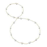 Necklace with 19 pearl stations accented with diamonds 36" 18kt yellow gold - Gaines Jewelers