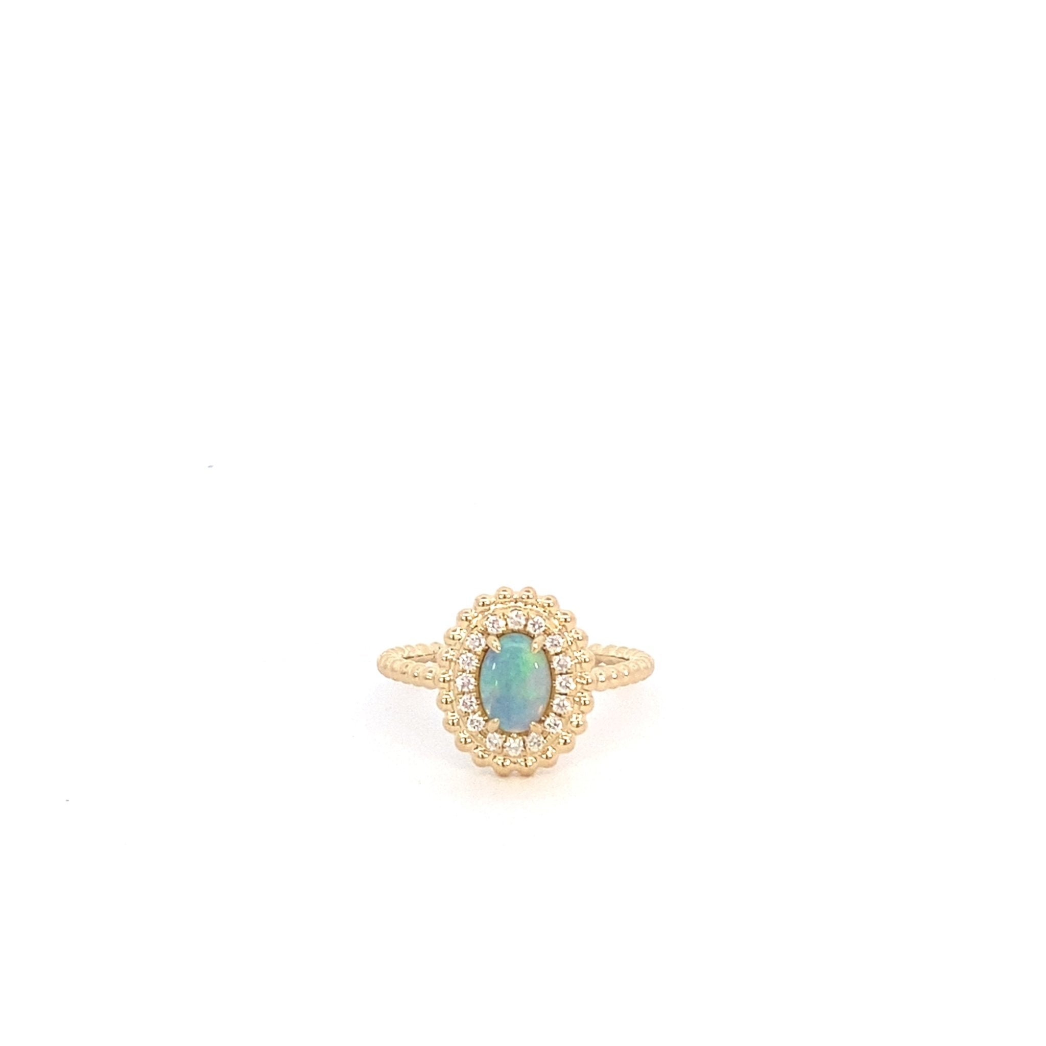 Opal and diamond ring with bead edge in 14kt yellow gold by Bassali - Gaines Jewelers