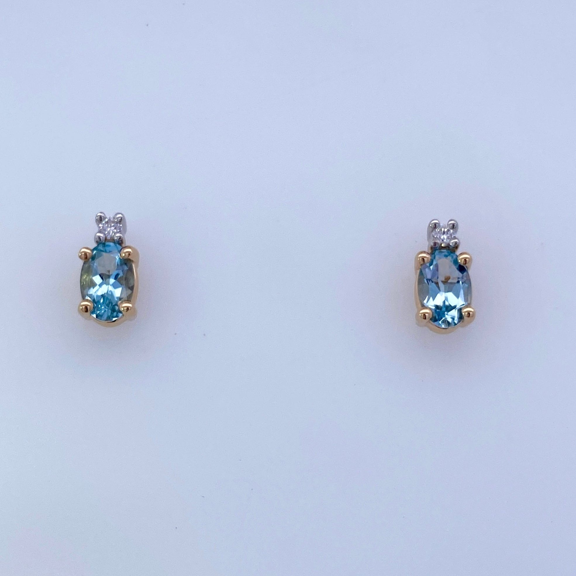 Oval Aqua and diamond Stud Earrings 14kt Yellow Gold - Rego - Gaines Jewelers