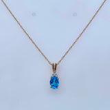 Oval Blue Topaz with Diamonds at Top 14kt Yellow Gold Pendant - Rego - Gaines Jewelers
