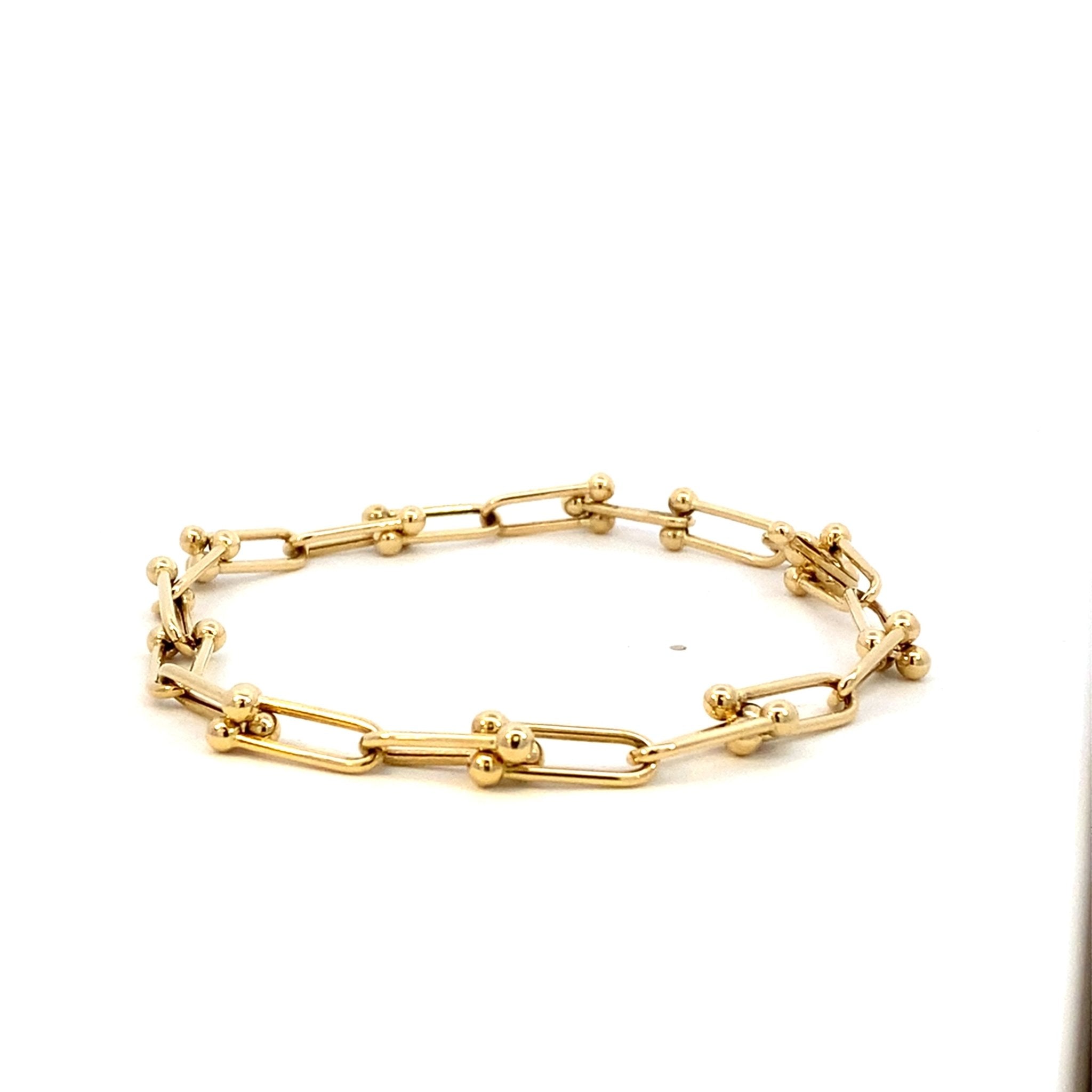 Paperclip Hardware 14k Yellow Gold Bracelet - Raymond Mazza - Gaines Jewelers