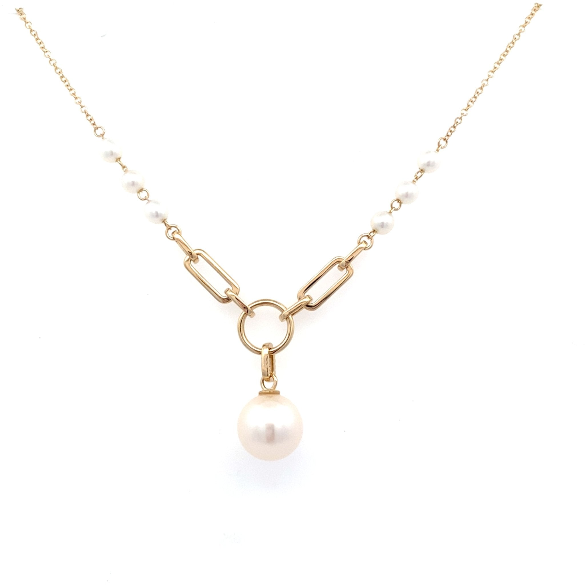 Pearl pendant with a large dropping 8.5mm pear, diamond links with pearls in 14t yellow gold by Bassali - Gaines Jewelers