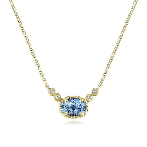 Pendant blue topaz and diamond on a 16-18' chain 14kt yellow gold - Gaines Jewelers