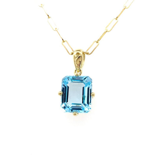 Pendant set with 1 Sky blue topaz on a paperclip chain 14kt yellow gold - Gaines Jewelers