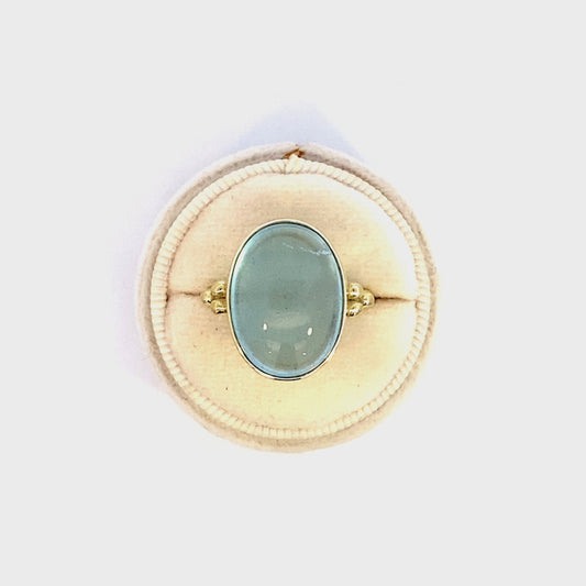 Ring aquamarine large oval in bezel 14kt yellow gold