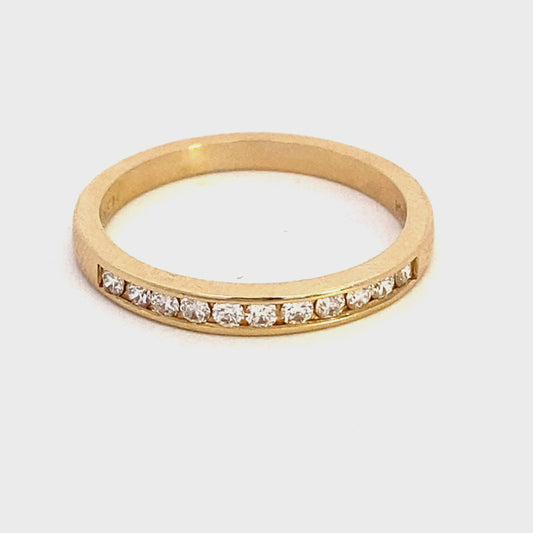 Diamond channel set anniversary band 14kt yellow gold