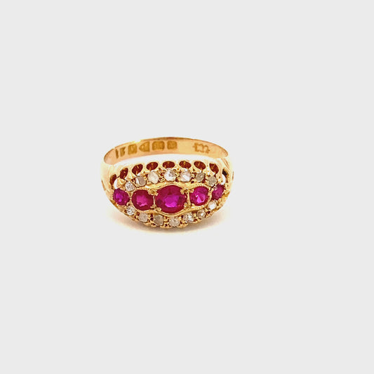 Antique ring graduated row of rubies and diamonds