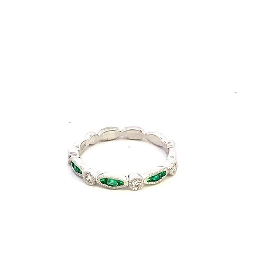 Ring 9 emerald and 4 diamond anniversary coin edge band - Gaines Jewelers
