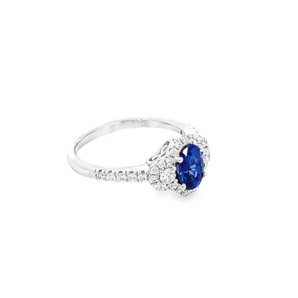 Ring blue sapphire diamond halo sides and shank 18kt white gold - Gaines Jewelers