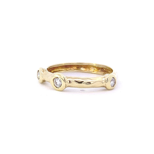 Ring Hammered yellow gold stackable band with 3 diamonds - Gaines Jewelers