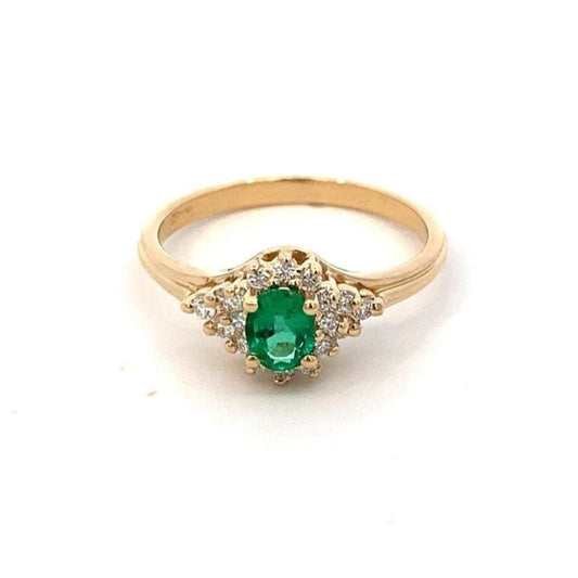 Ring - oval emerald with diamond halo and sides 14kt yellow gold - Gaines Jewelers