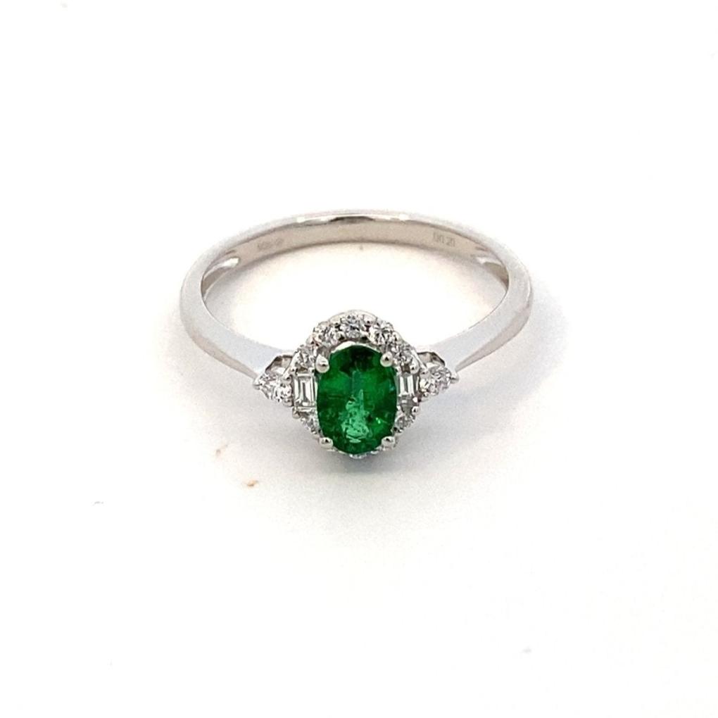 Ring - oval emerald with diamond halo & sides 14kt white gold - Gaines Jewelers