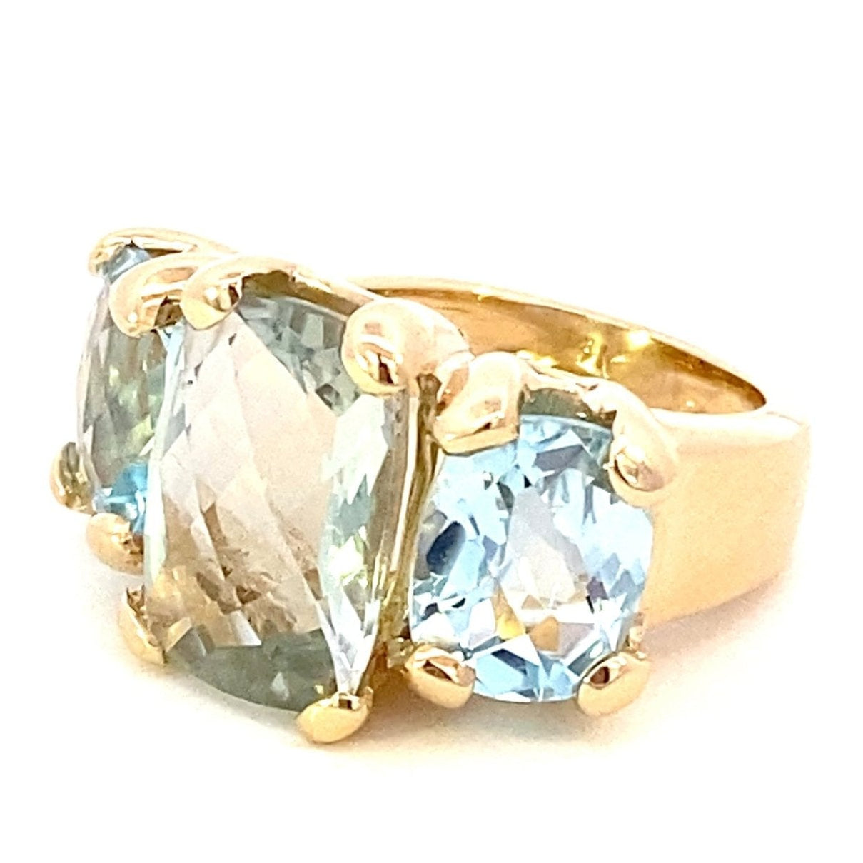Ring set with a center green amethyst with side blue topaz in 14kt yellow gold - Gaines Jewelers
