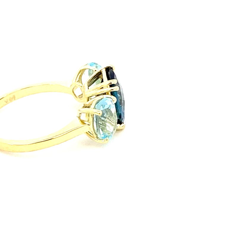 Ring set with a center London blue topaz flanked by Sky blue topaz 14kt yellow gold - Gaines Jewelers