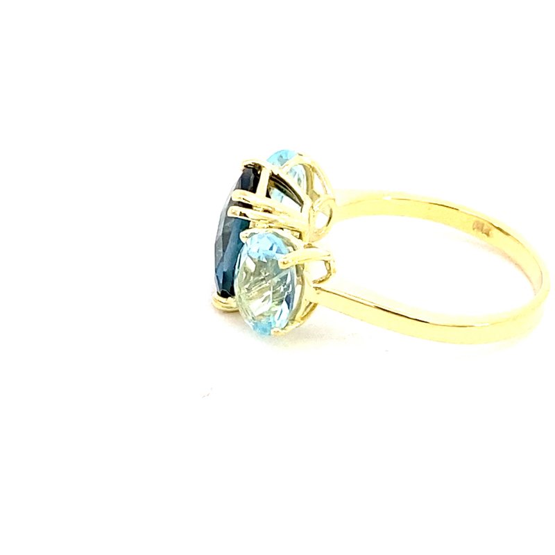 Ring set with a center London blue topaz flanked by Sky blue topaz 14kt yellow gold - Gaines Jewelers