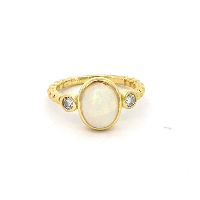 Ring set with an opal and accented with diamonds 14kt yellow gold - Gaines Jewelers