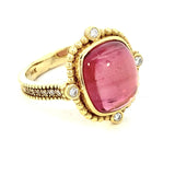 Ring set with pink tourmaline, diamond shank in 14kt yellow gold by Raymond Mazza - Gaines Jewelers