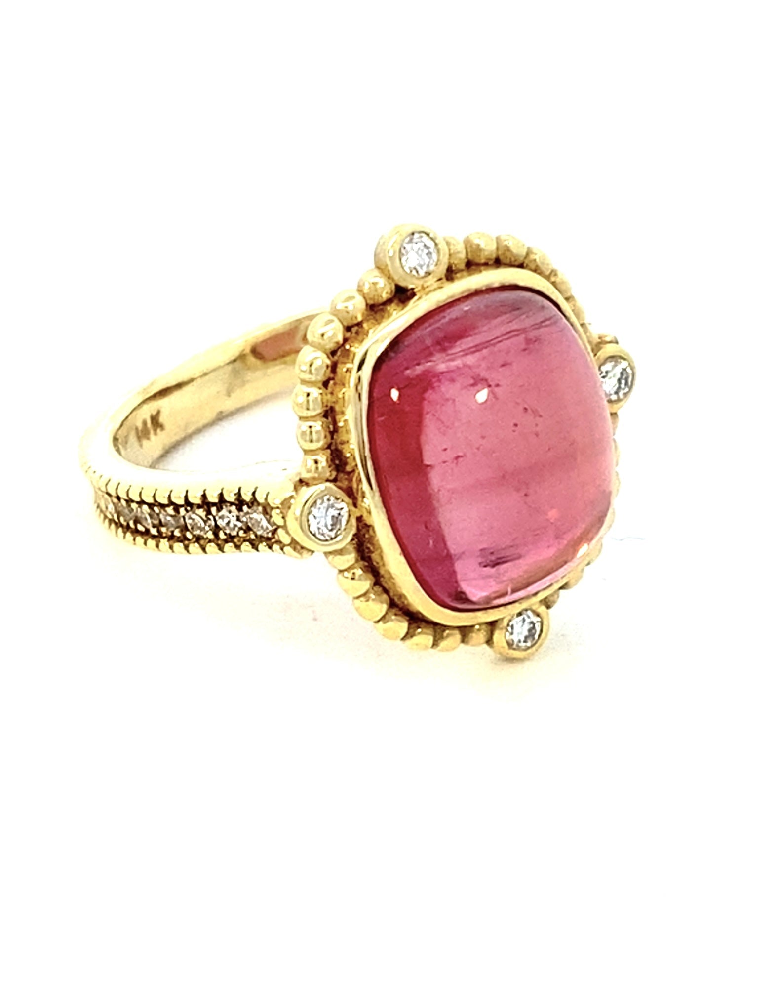 Ring set with pink tourmaline, diamond shank in 14kt yellow gold by Raymond Mazza - Gaines Jewelers