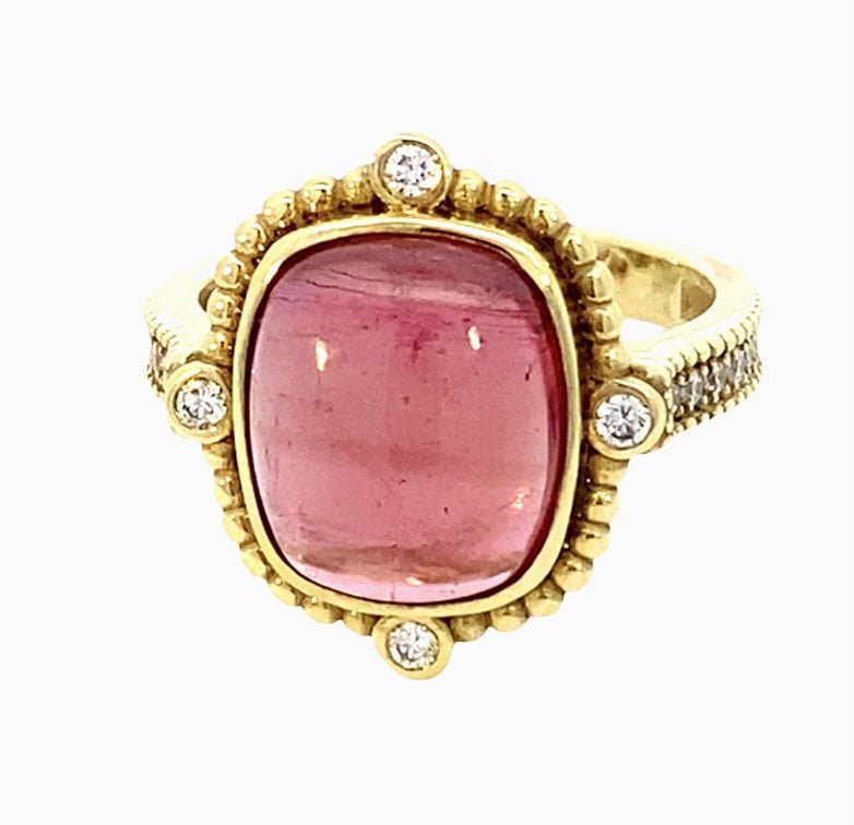 Ring set with pink tourmaline, diamond shank in 14kt yellow gold by Raymond Mazza - Gaines Jewelers