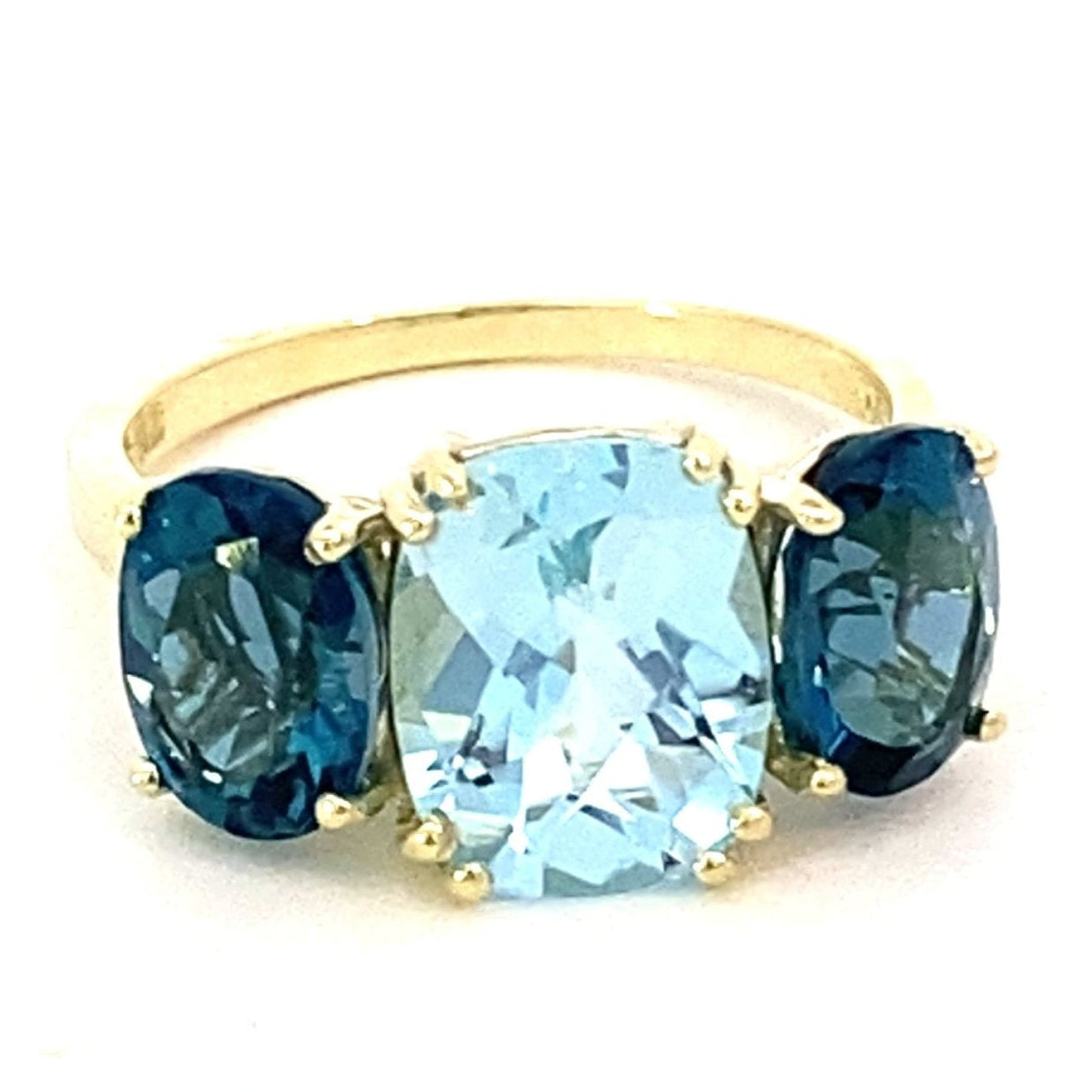 Ring with Sky blue topaz flanked by London blue topaz 14kt yellow gold - Gaines Jewelers