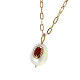 Ruby Bezel set into Small White Oval Pearl 14kt Yellow Gold - Raymond Mazza - Gaines Jewelers