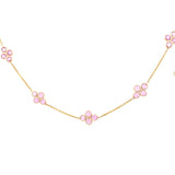 Station necklace with 4 bezel set round pink sapphires in 14kt yellow gold by Raymond Mazza - Gaines Jewelers