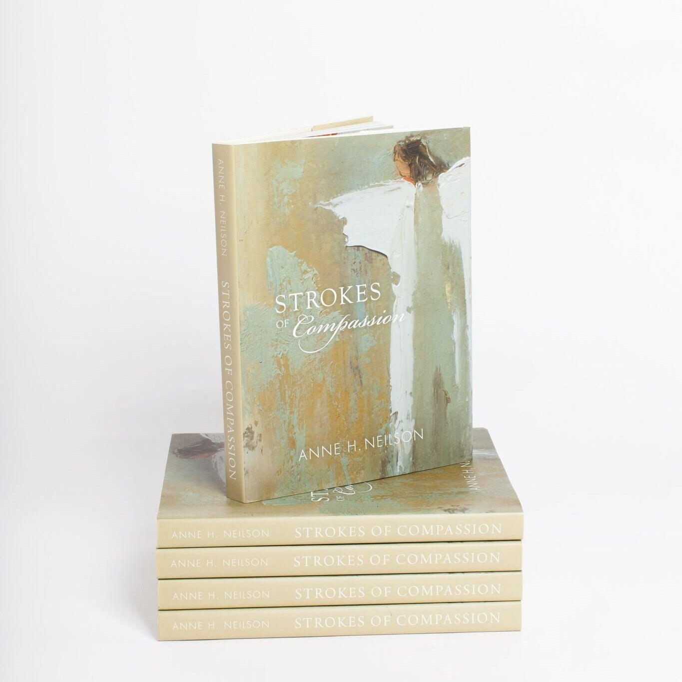 Strokes of Compassion Book - Anne Neilson Home - Gaines Jewelers