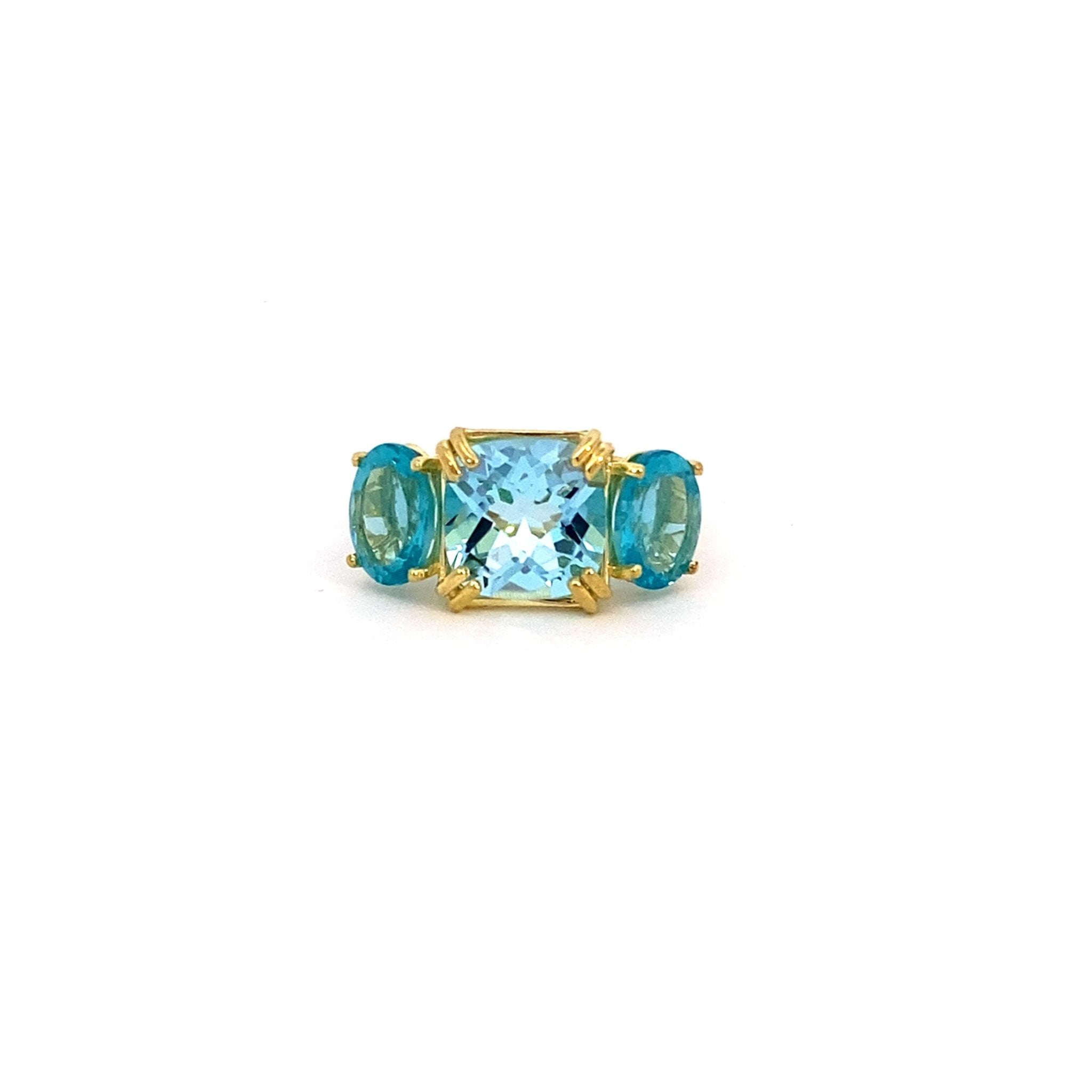 Three-stone ring set with blue topaz & appatite in 14kt yellow gold by Raymond Mazza - Gaines Jewelers