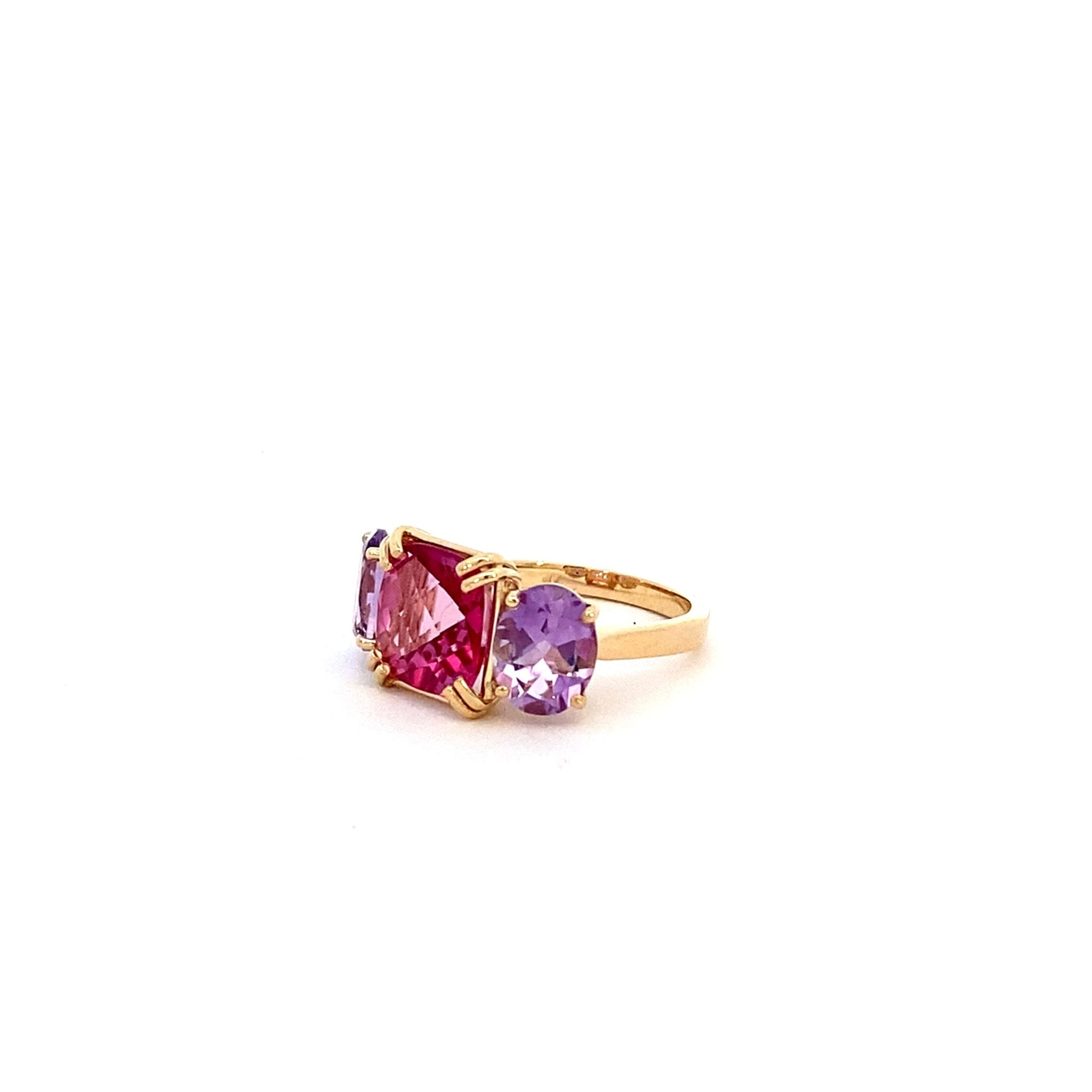 Three stone ring set with pink quartz & amethyst in 14kt yellow gold by Raymond Mazza - Gaines Jewelers