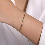 14K Yellow Gold Split Cuff Bracelet with Diamond Flower Caps - Gaines Jewelers