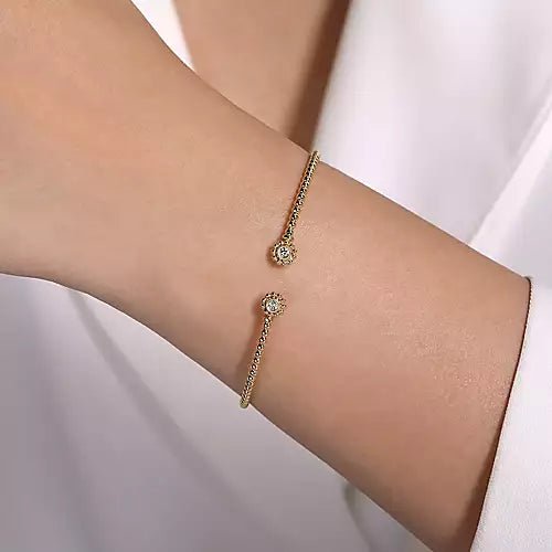 14K Yellow Gold Split Cuff Bracelet with Diamond Flower Caps - Gaines Jewelers