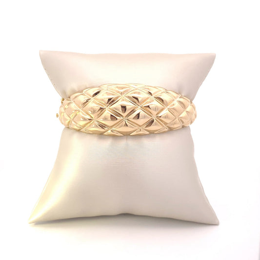 Bracelet- 14k yellow gold bangle quilted dome - Gaines Jewelers