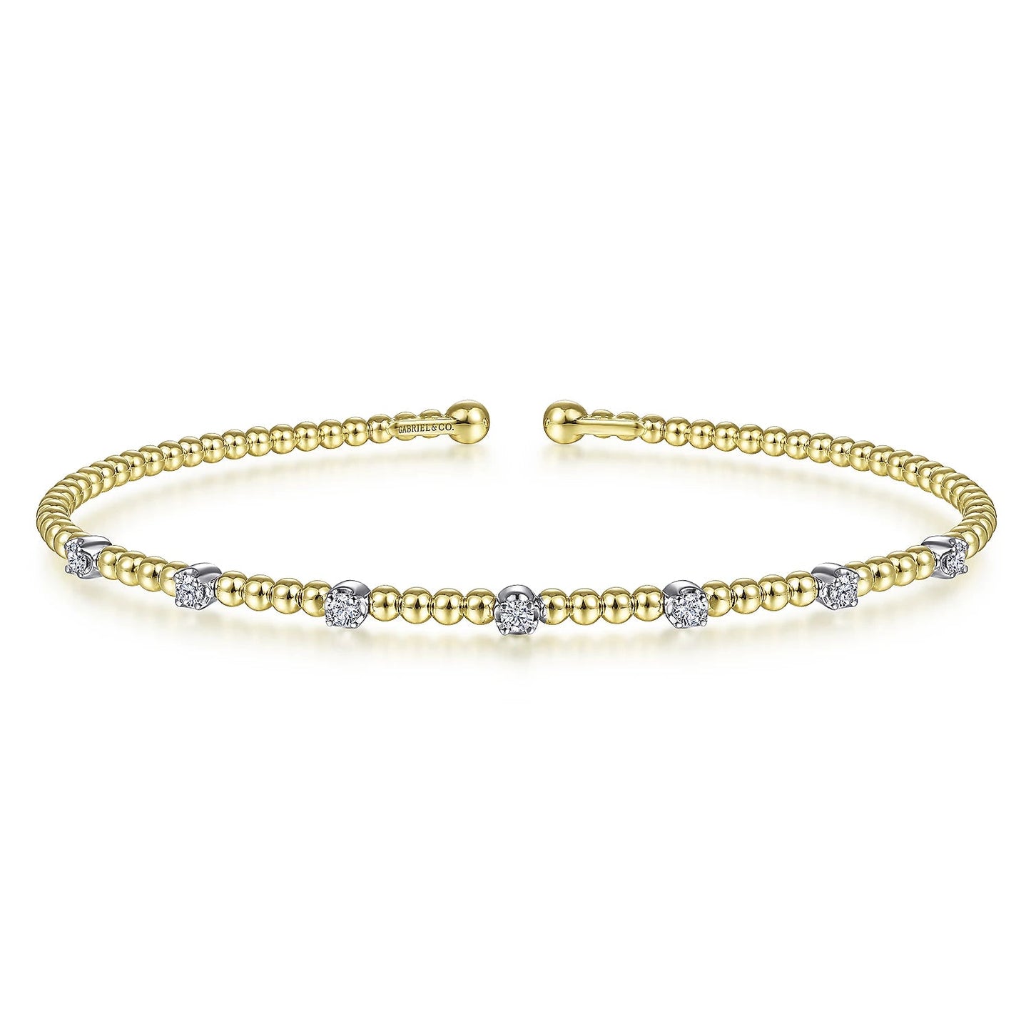 Bracelet- 14k yellow gold bead cuff 7 diamond stations on top - Gaines Jewelers