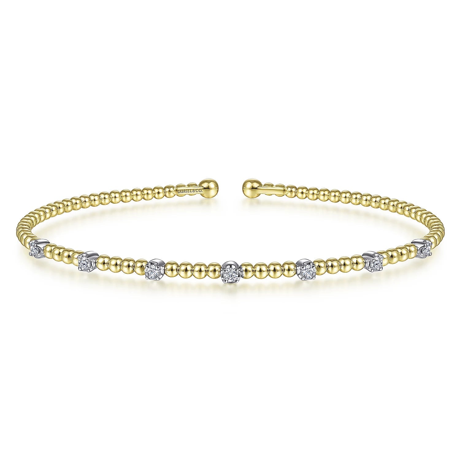 Bracelet- 14k yellow gold bead cuff 7 diamond stations on top - Gaines Jewelers