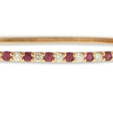 Bracelet- 14k Yellow Or Rose Gold Ruby And Diamond Bangle - Gaines Jewelers