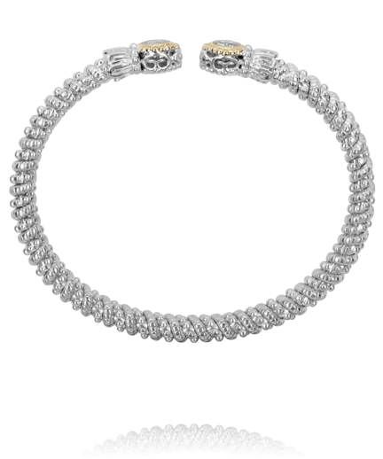 Bracelet- 6mm bangle bracelet with oval shape diamond cluster on top - Gaines Jewelers