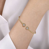 Bracelet flex cuff diamond clusters at ends 14kt yellow gold - Gaines Jewelers