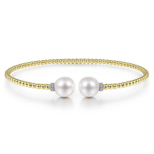 Bracelet flex cuff pearl caps and diamond 14kt yellow gold - Gaines Jewelers