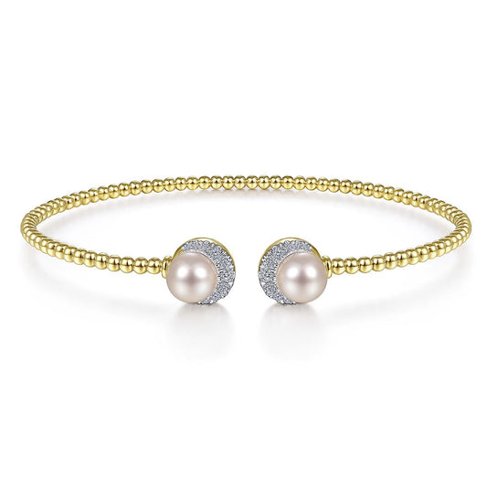 Bracelet flex cuff pearl & diamond caps 14kt yellow gold - Gaines Jewelers