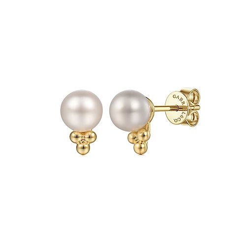 Earrings- 14k yg pearl stud with bead treatment - Gaines Jewelers