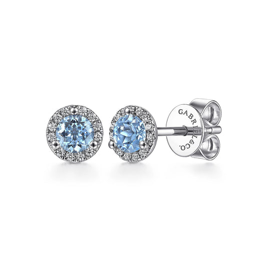 Earrings- Blue Topaz studs w/diamond halo - Gaines Jewelers