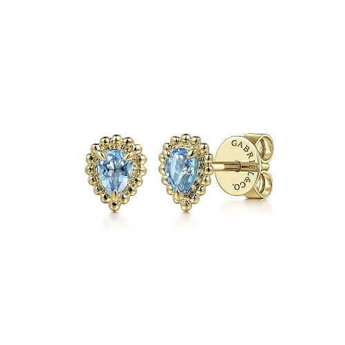 Earrings pear-shape blue topaz bead halo 14kt yellow gold - Gaines Jewelers