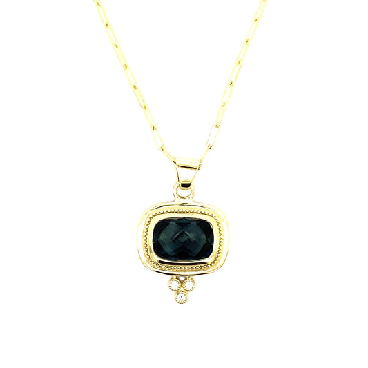 Pendant blue topaz in decorative bezel, diamonds at top, paperclip chain 14k yellow gold - Gaines Jewelers